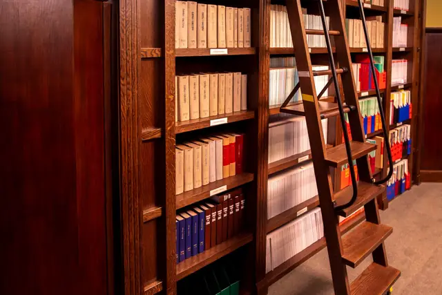 A library with law books on wooden shelves
